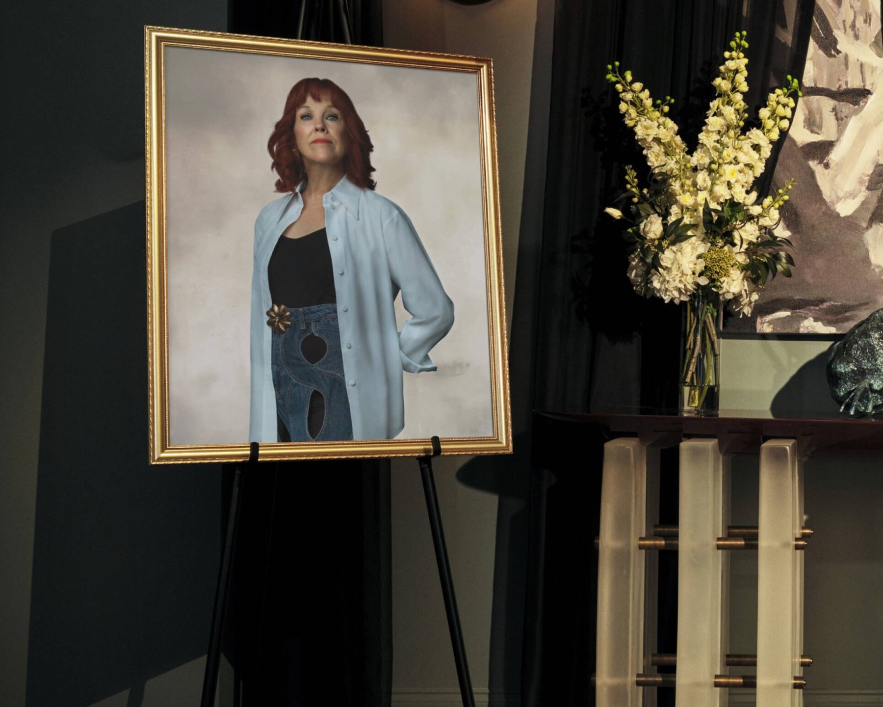 Delia Deetz portrait on an easel inside the Deetz home