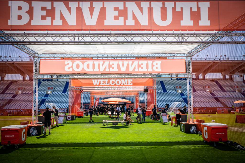 Branded welcome gateway in Benvenuti, Bienvenidos and Welcome at the tournament entrance
