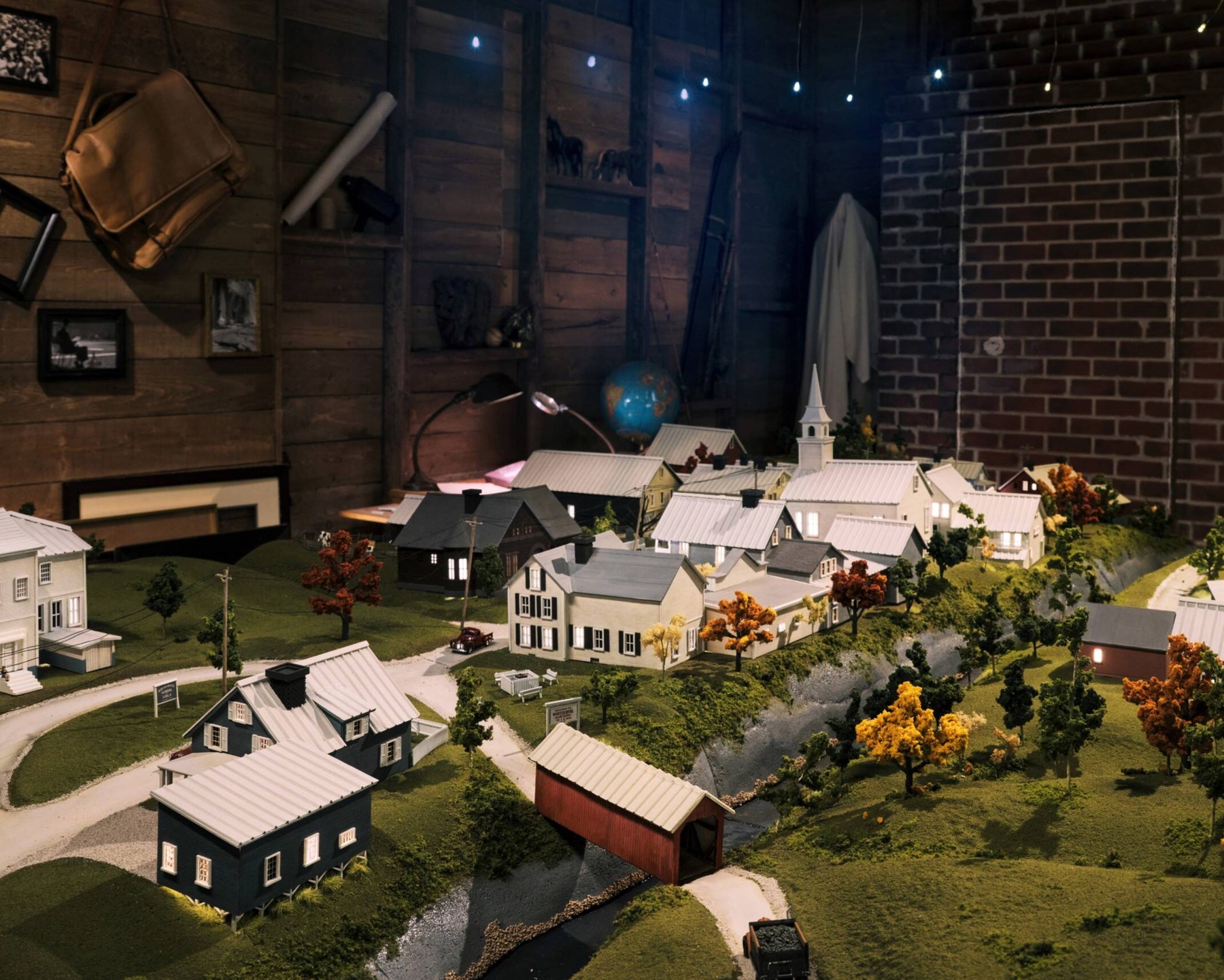 Detailed model village from the attic, a nod to the original film