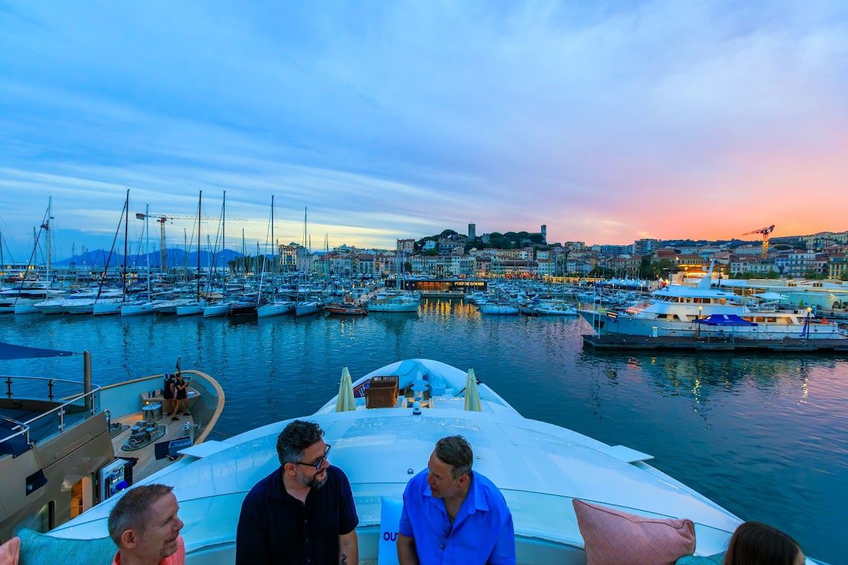 Sunset over Port de Cannes from the deck of Yacht Hana